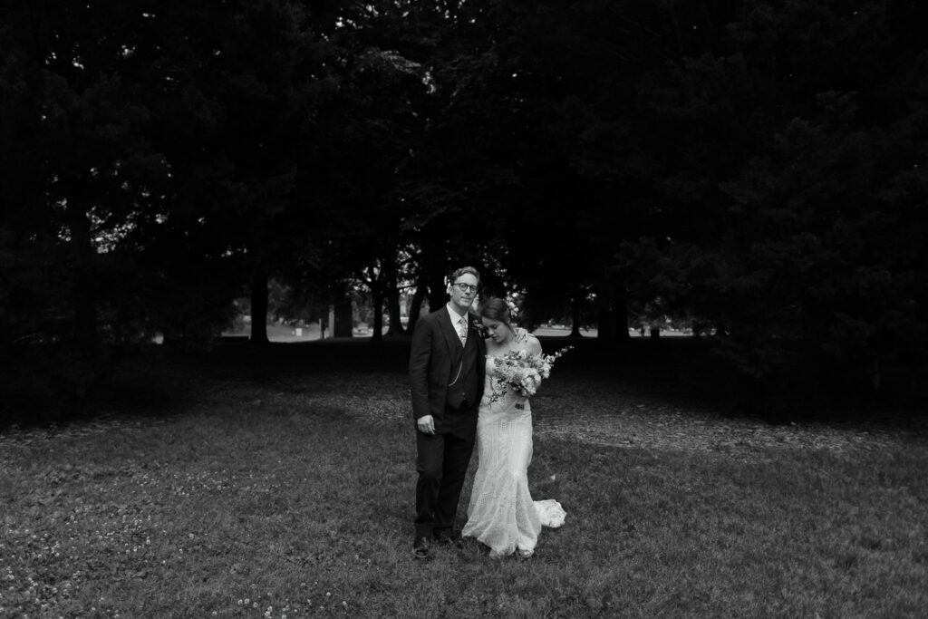 A couple taking wedding portraits at Piedmont Park Greystone.