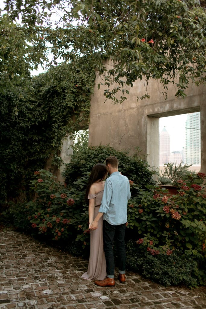 A couple embracing at Summerour which is a gorgeous Luxury Atlanta Wedding Venue A couple embracing at Summerour which is a gorgeous Luxury Atlanta Wedding Venue